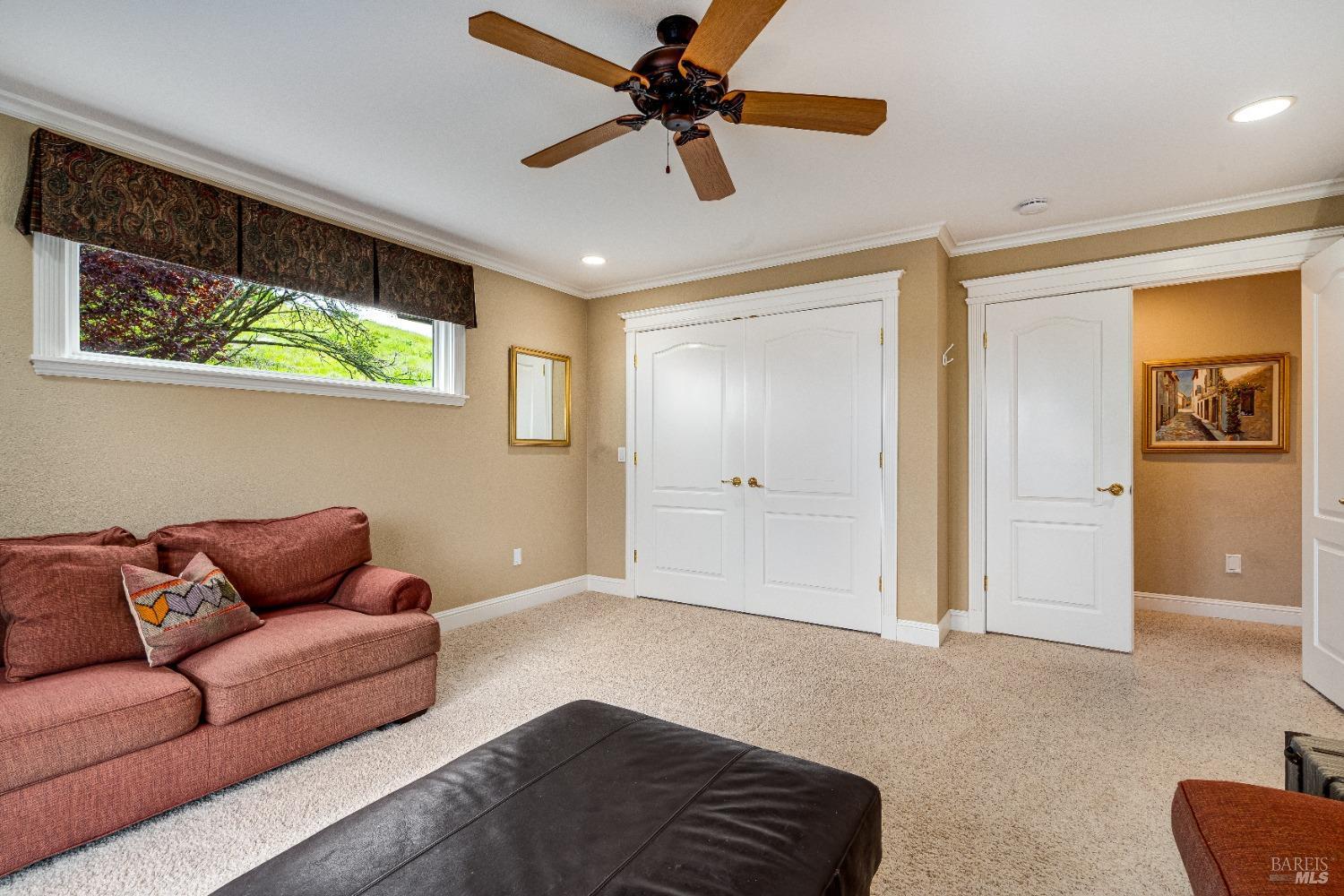 4720 Guenza Road Santa Rosa, CA 95404 - Photo 36 of 94 a living room with furniture and a window