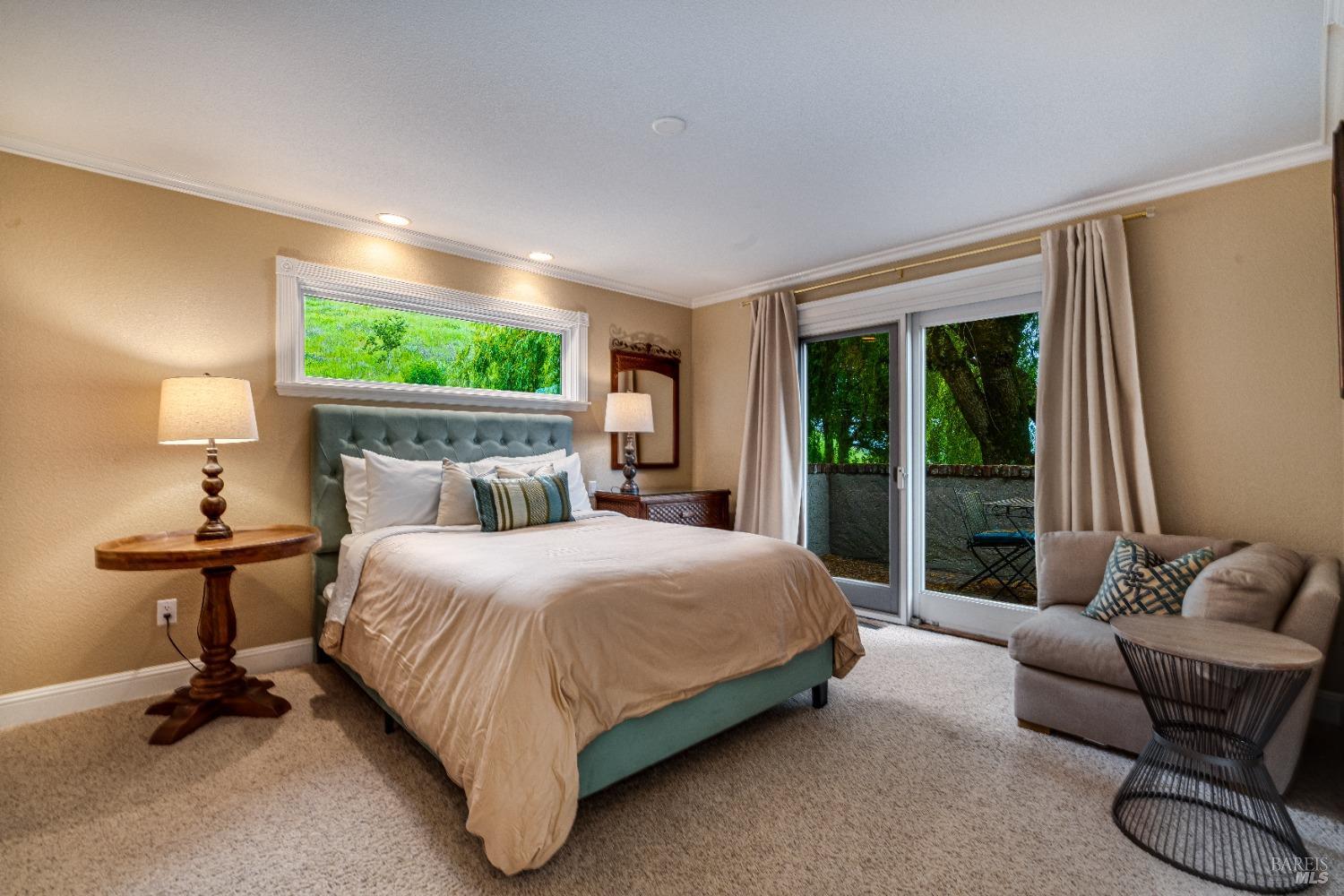 4720 Guenza Road Santa Rosa, CA 95404 - Photo 37 of 94 a bedroom with a bed and a couch