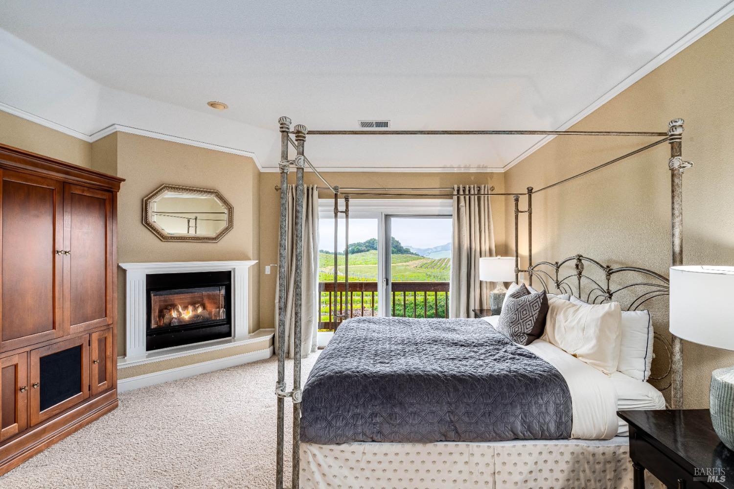 4720 Guenza Road Santa Rosa, CA 95404 - Photo 46 of 94 a bedroom with a bed and a fireplace