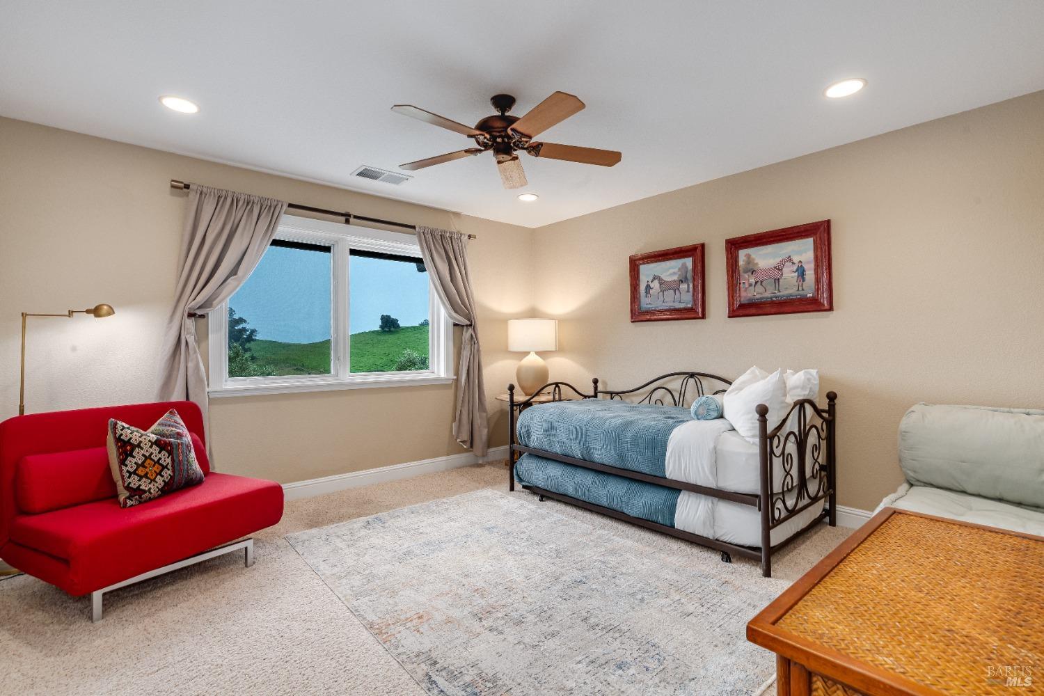 4720 Guenza Road Santa Rosa, CA 95404 - Photo 56 of 94 a bedroom with a bed and window