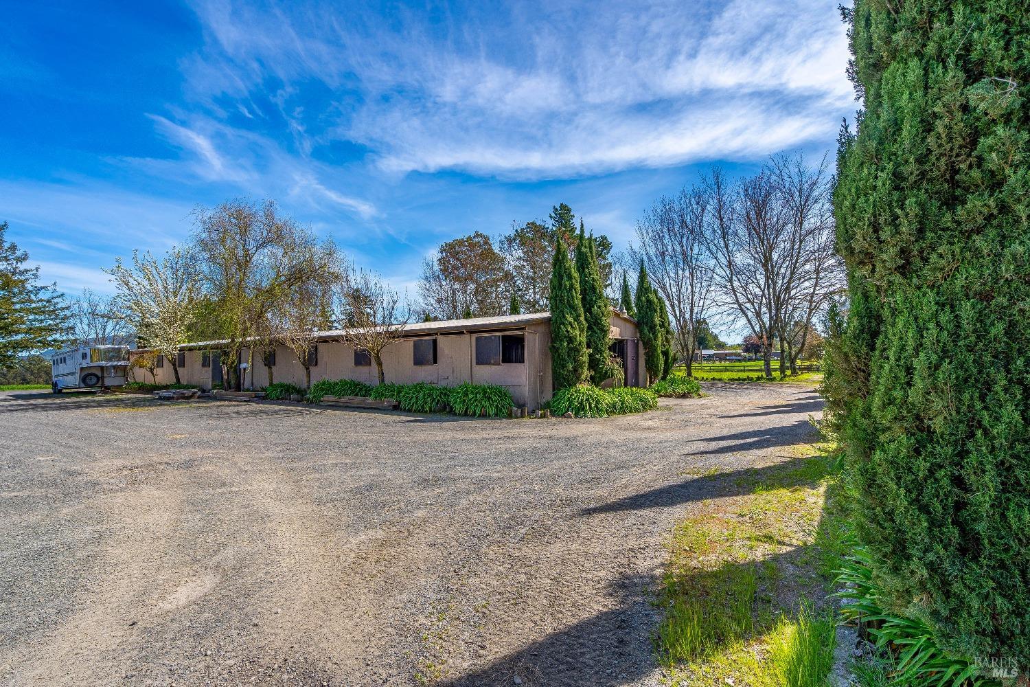 4720 Guenza Road Santa Rosa, CA 95404 - Photo 69 of 94 a front view of a house with a yard and a garage