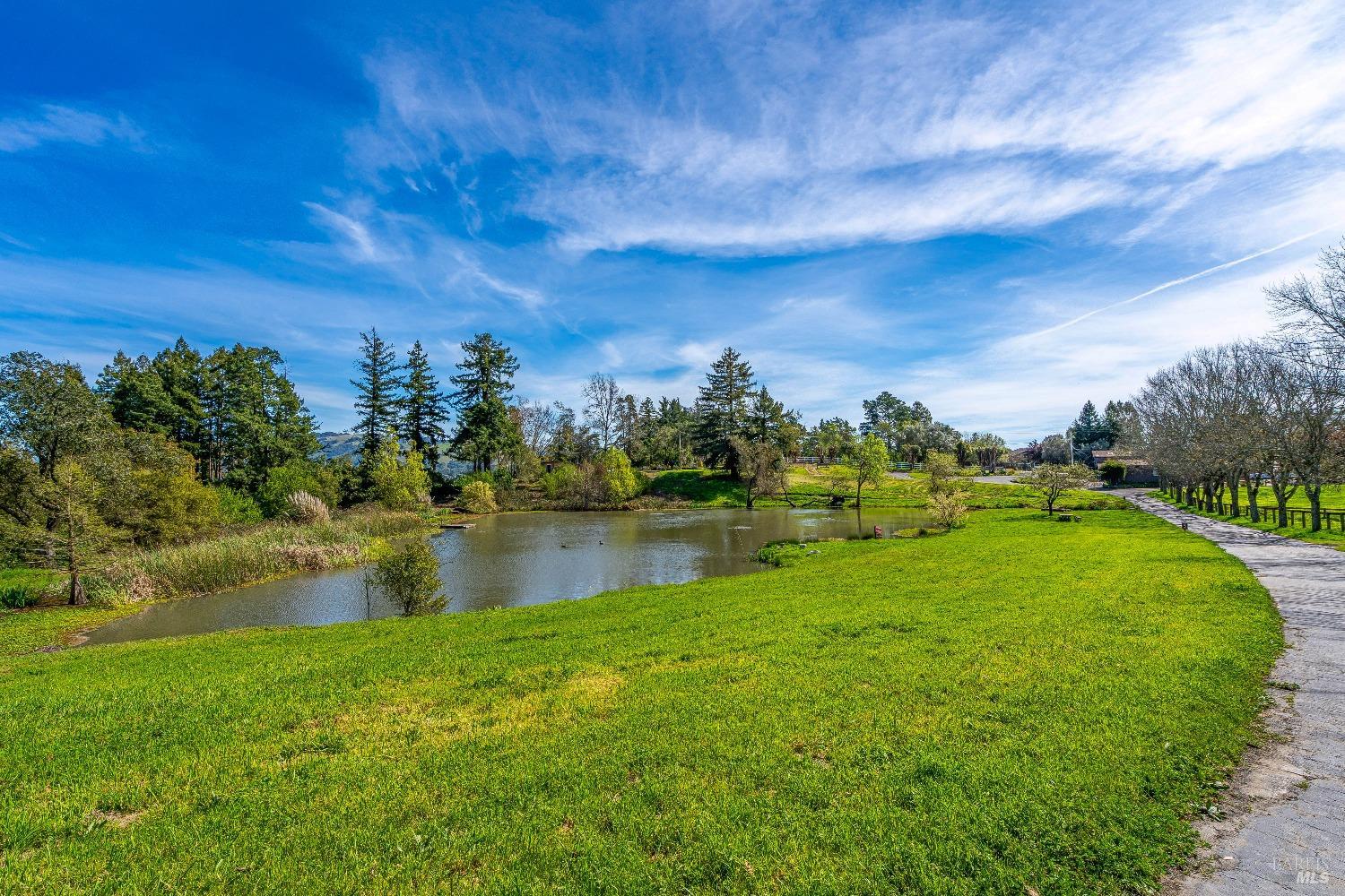 4720 Guenza Road Santa Rosa, CA 95404 - Photo 77 of 94 a view of a lake with houses in the back