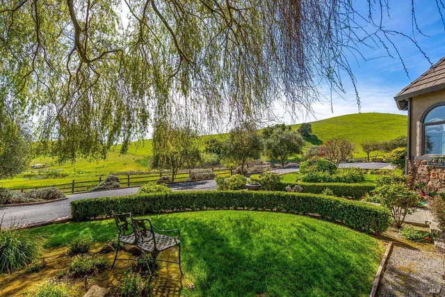 a view of a living room and kitchen