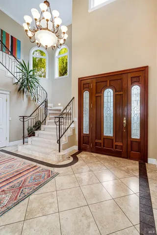 a living room with furniture fireplace and a flat screen tv