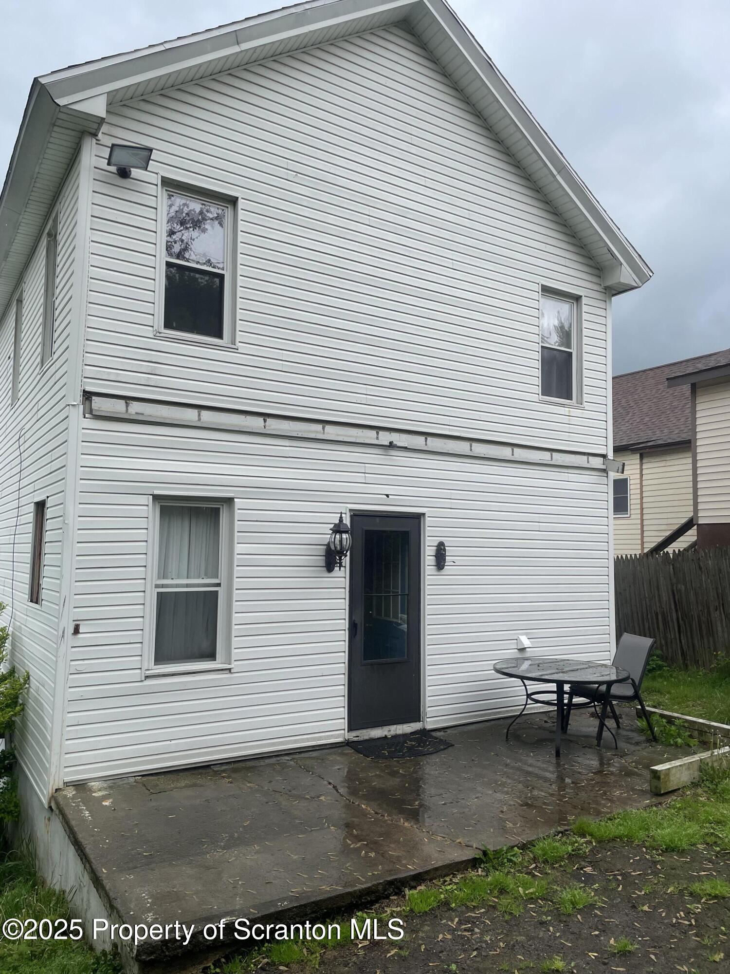 841 Hill Street Archbald, PA 18403 - Photo 22 of 22 a view of backyard of house and sitting area