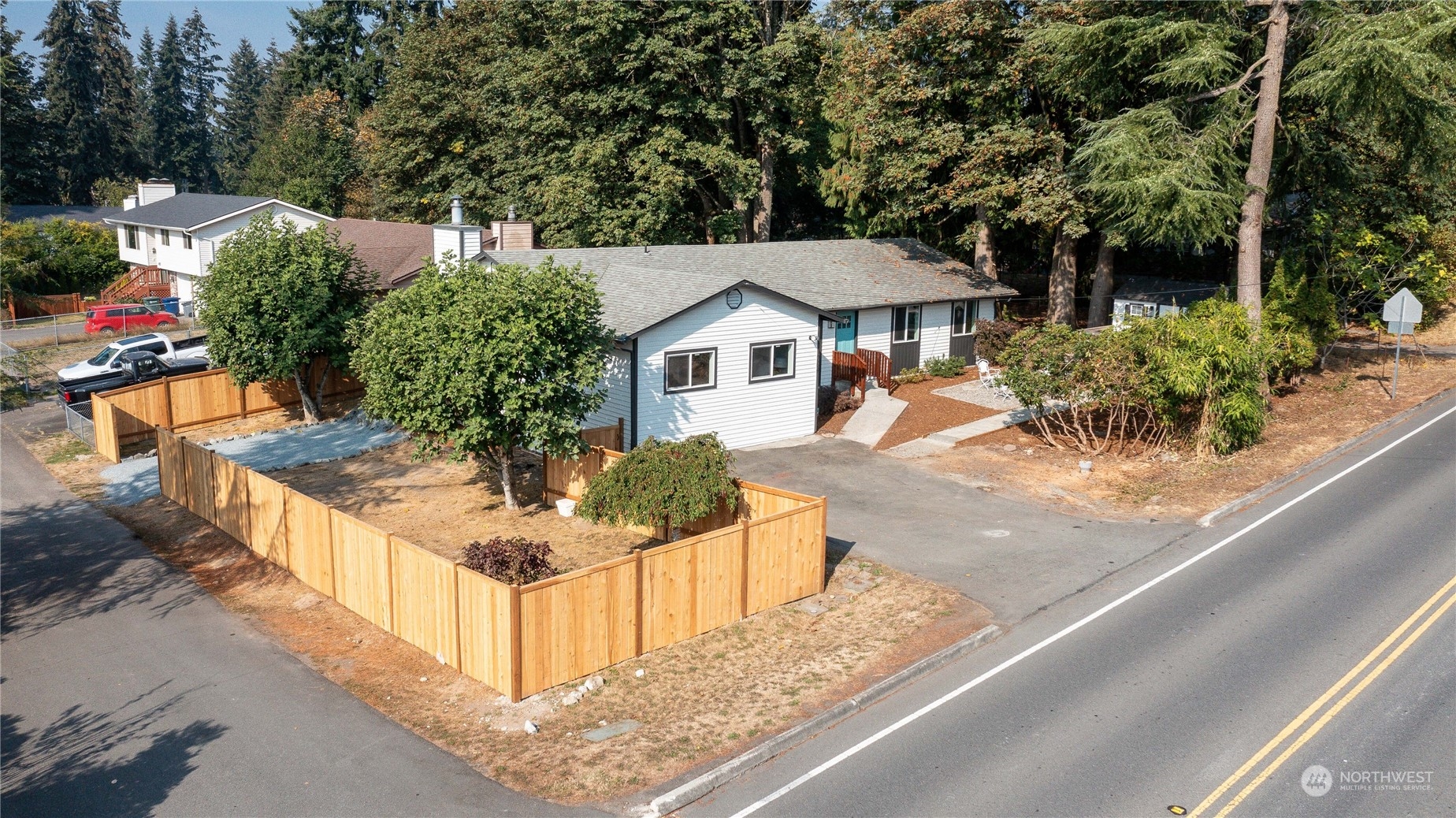 21704 4th Avenue West Bothell, WA 98021 - Photo 1 of 23 a front view of a house with trees