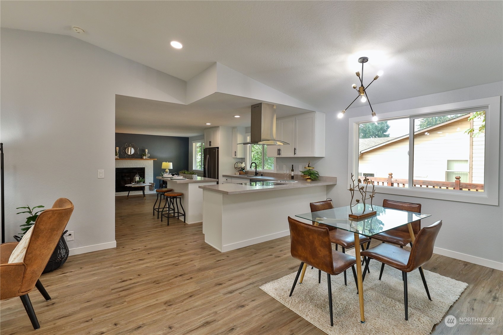 21704 4th Avenue West Bothell, WA 98021 - Photo 7 of 23 a dining room with furniture and a floor to ceiling window