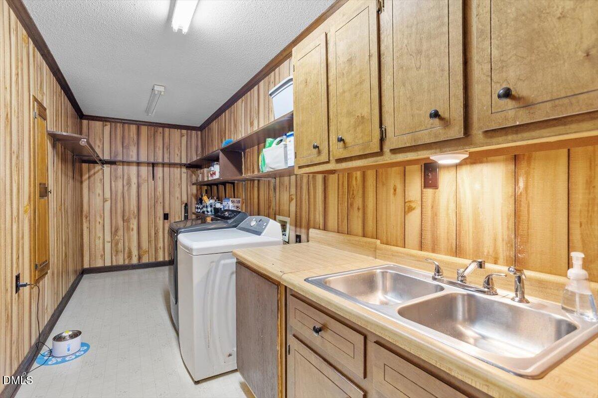 9966 US Highway 421 South Erwin, NC 28339 - Photo 21 of 34 a kitchen with a sink cabinets and utility
