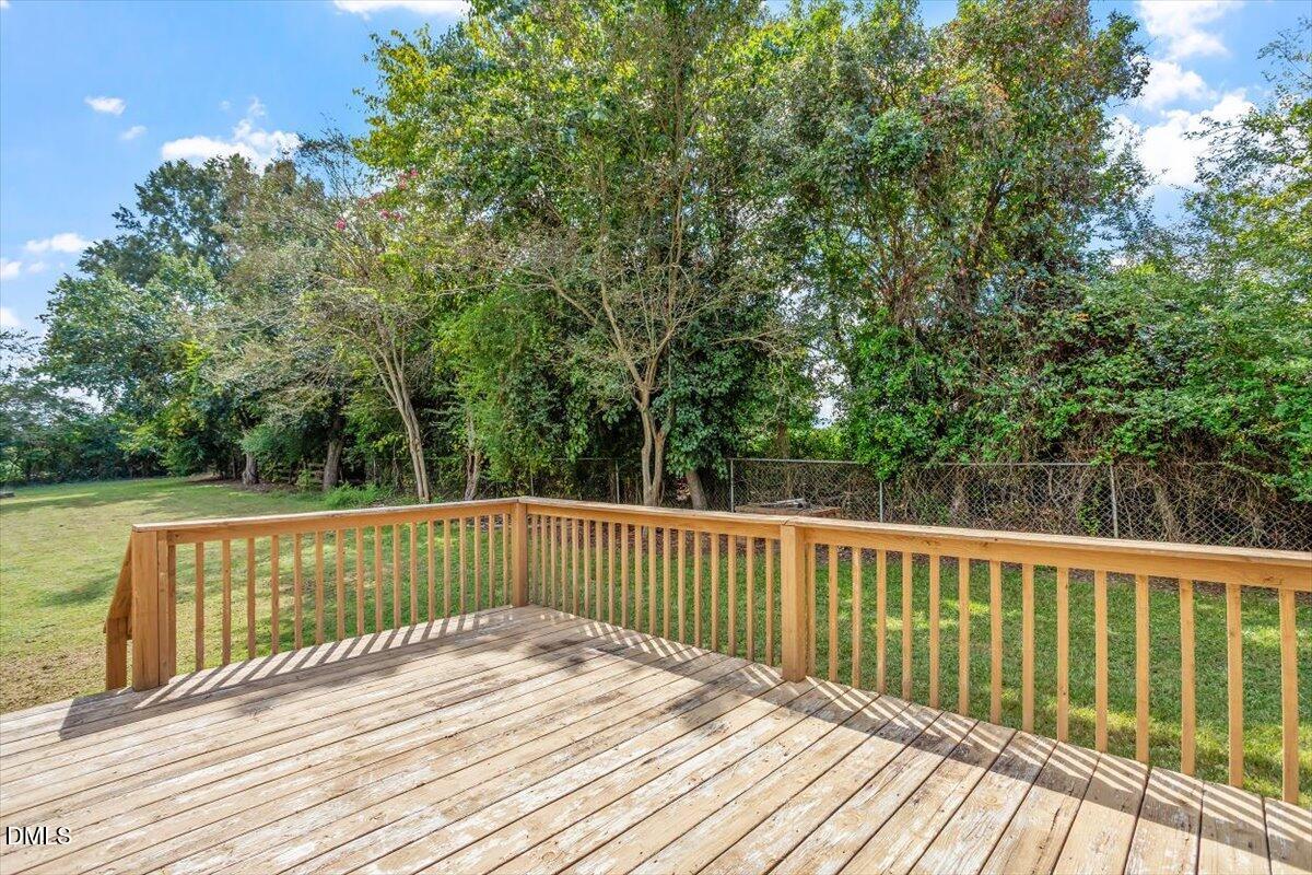 9966 US Highway 421 South Erwin, NC 28339 - Photo 30 of 34 a view of deck with wooden floor and fence