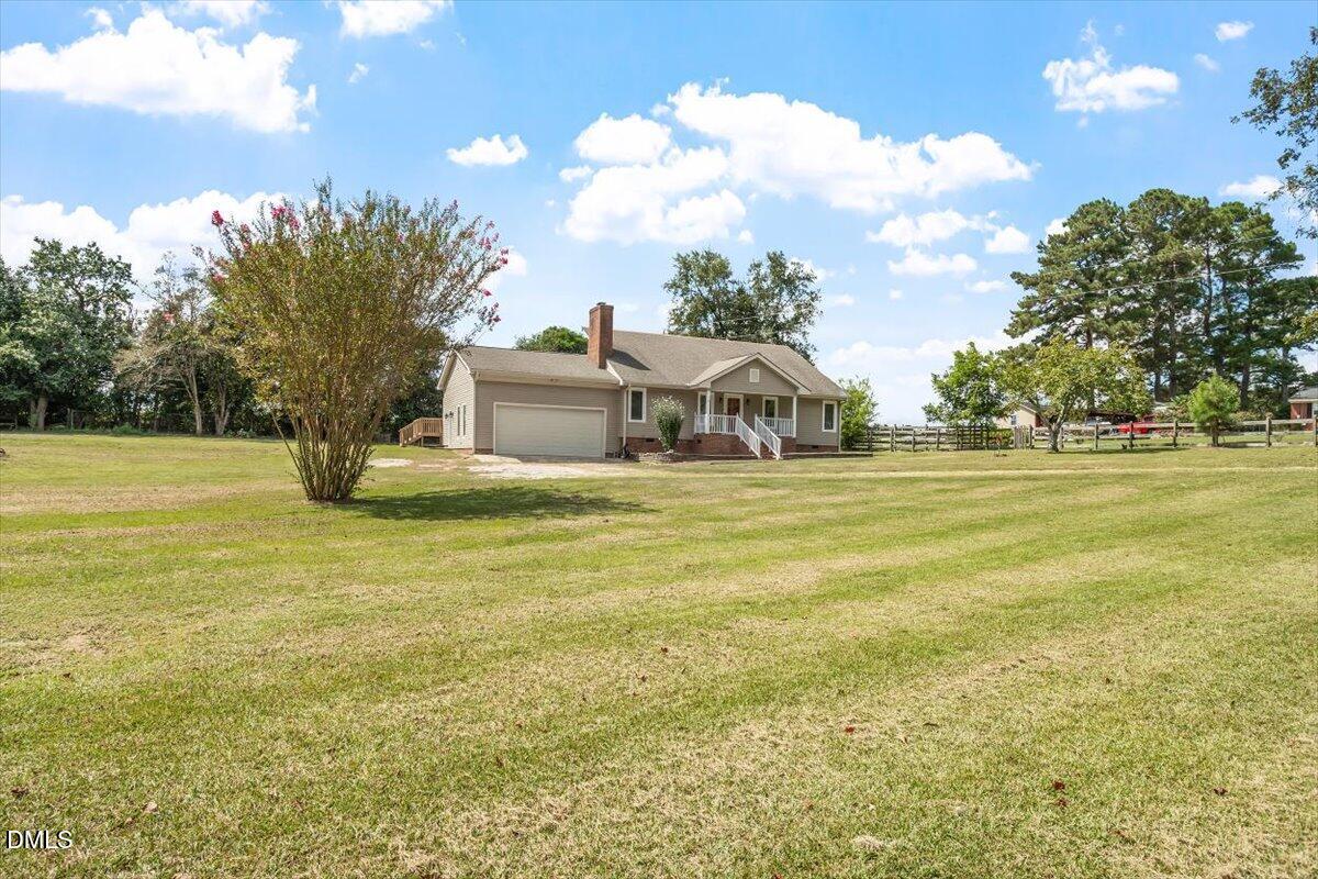 9966 US Highway 421 South Erwin, NC 28339 - Photo 6 of 34 a view of a house with a yard