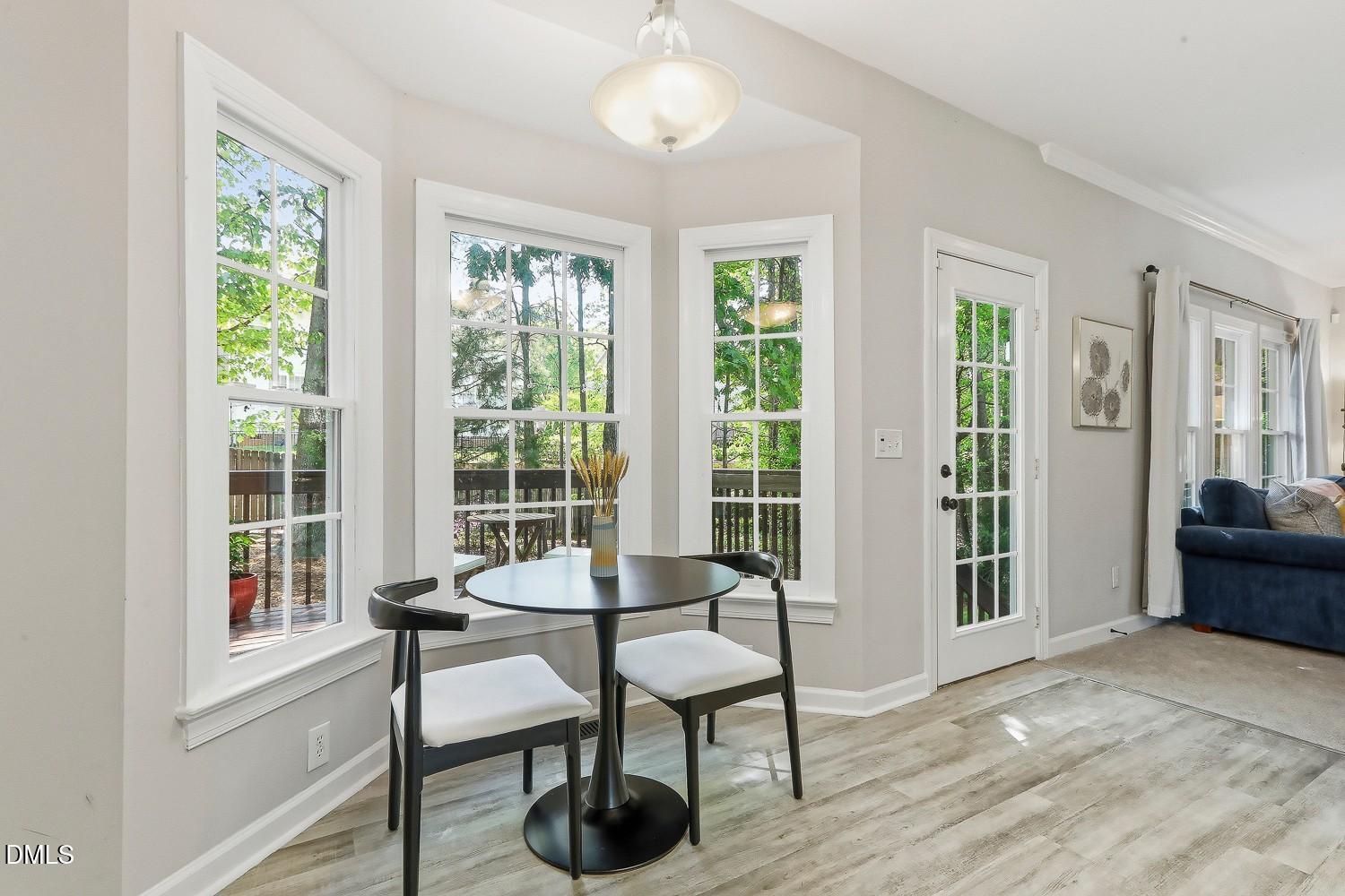 4001 Batiste Road Raleigh, NC 27613 - Photo 20 of 63 a view of a livingroom with furniture and a window