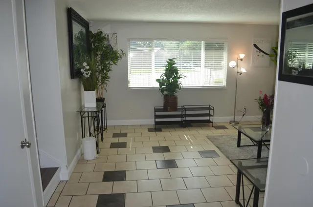 a view of entryway with livingroom and furniture