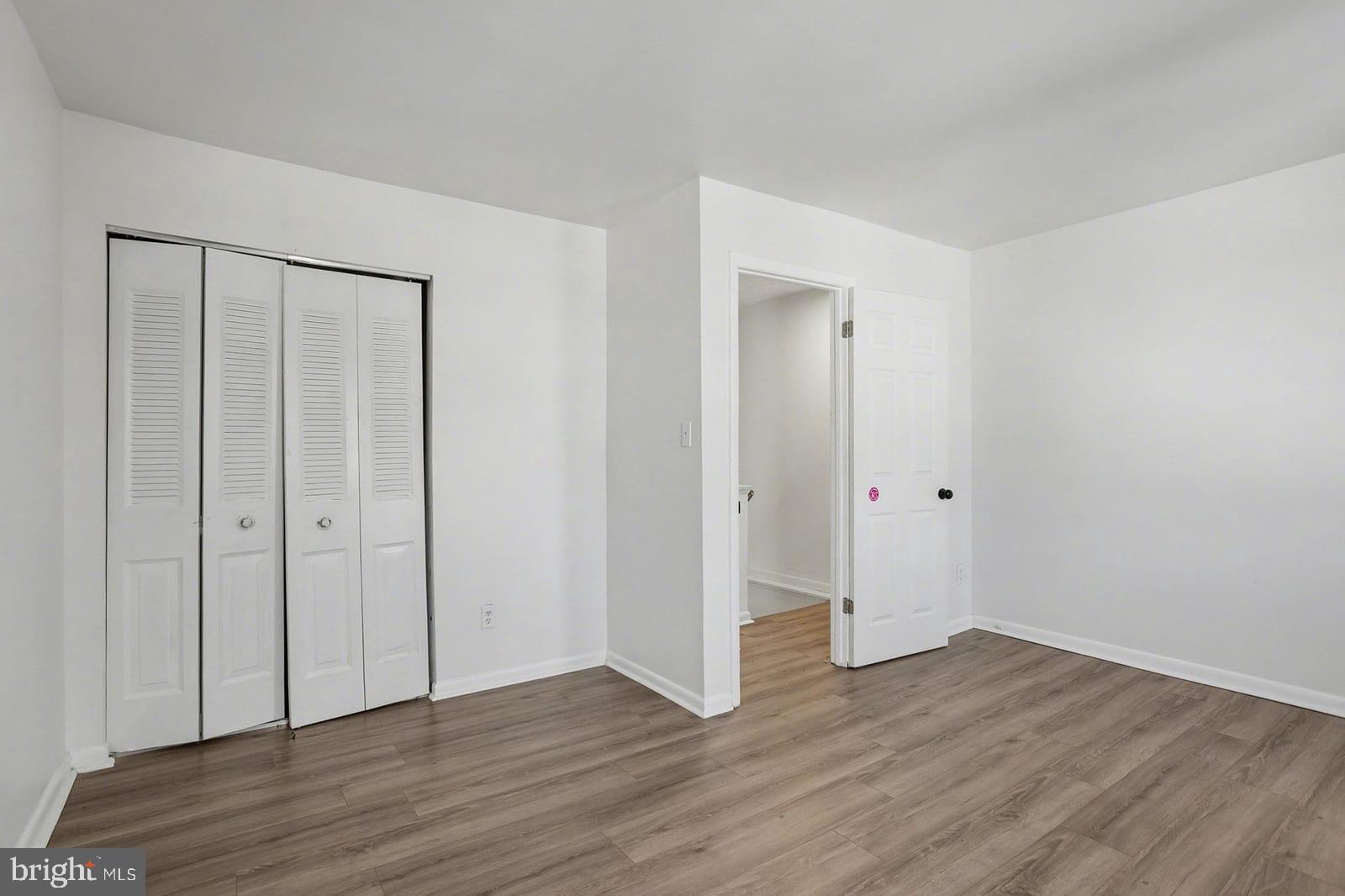 834 West Spring Meadow Court Edgewood, MD 21040 - Photo 11 of 25 a view of an empty room with wooden floor
