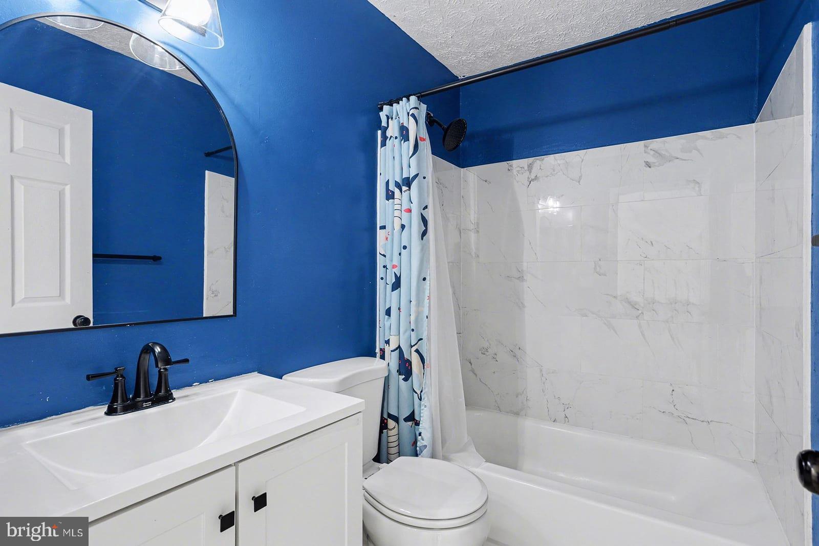 834 West Spring Meadow Court Edgewood, MD 21040 - Photo 12 of 25 a bathroom with a sink a toilet and shower