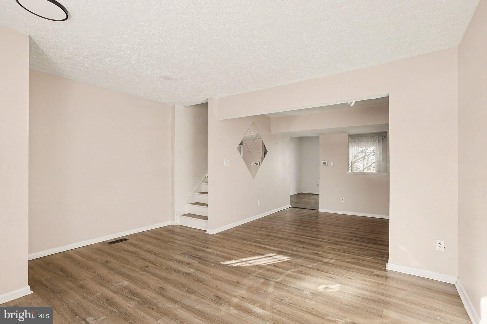834 West Spring Meadow Court Edgewood, MD 21040 - Photo 3 of 25 a view of empty room with wooden floor