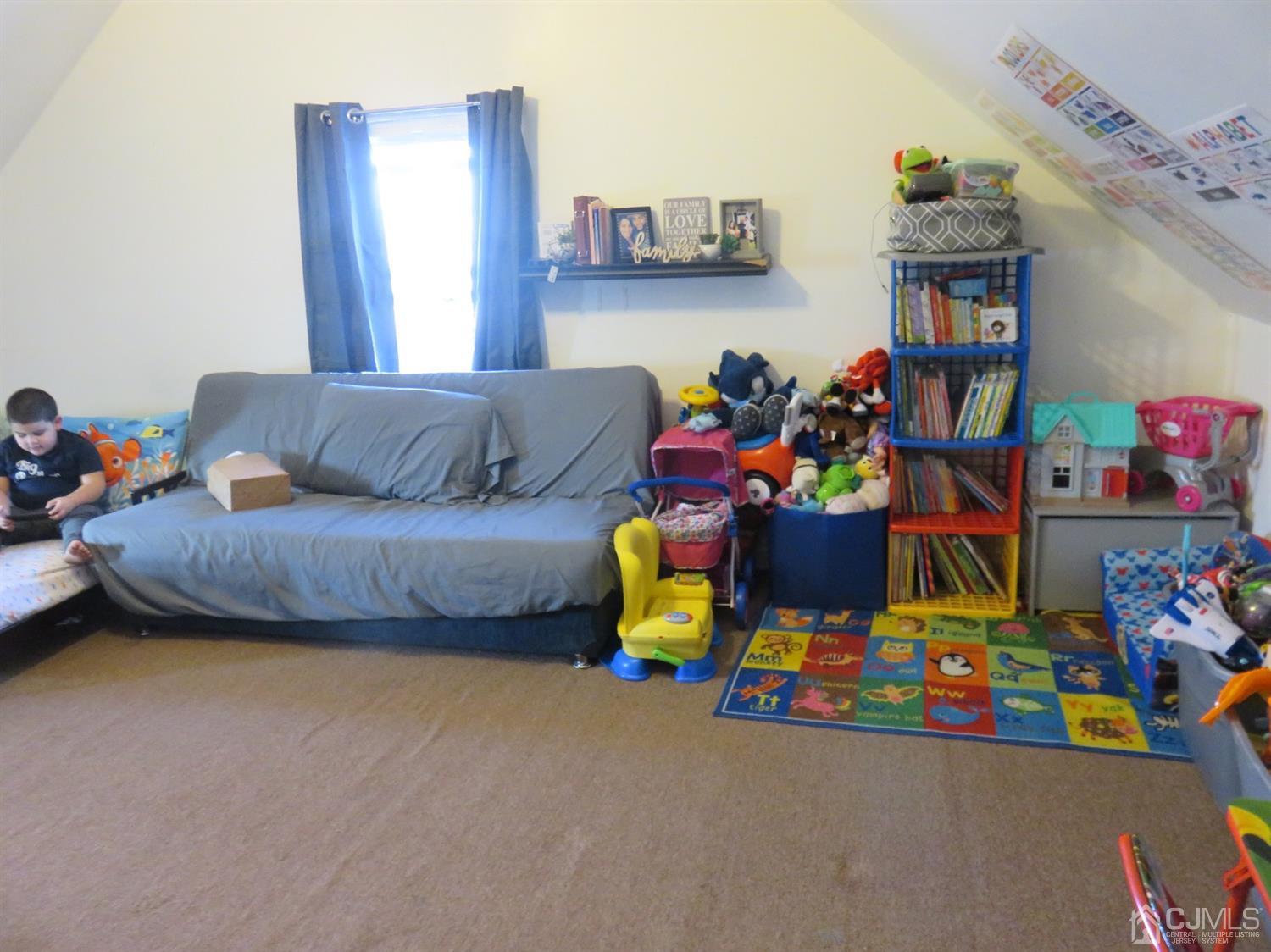 268 Rector Street Perth Amboy, NJ 08861 - Photo 12 of 13 a children room with toys