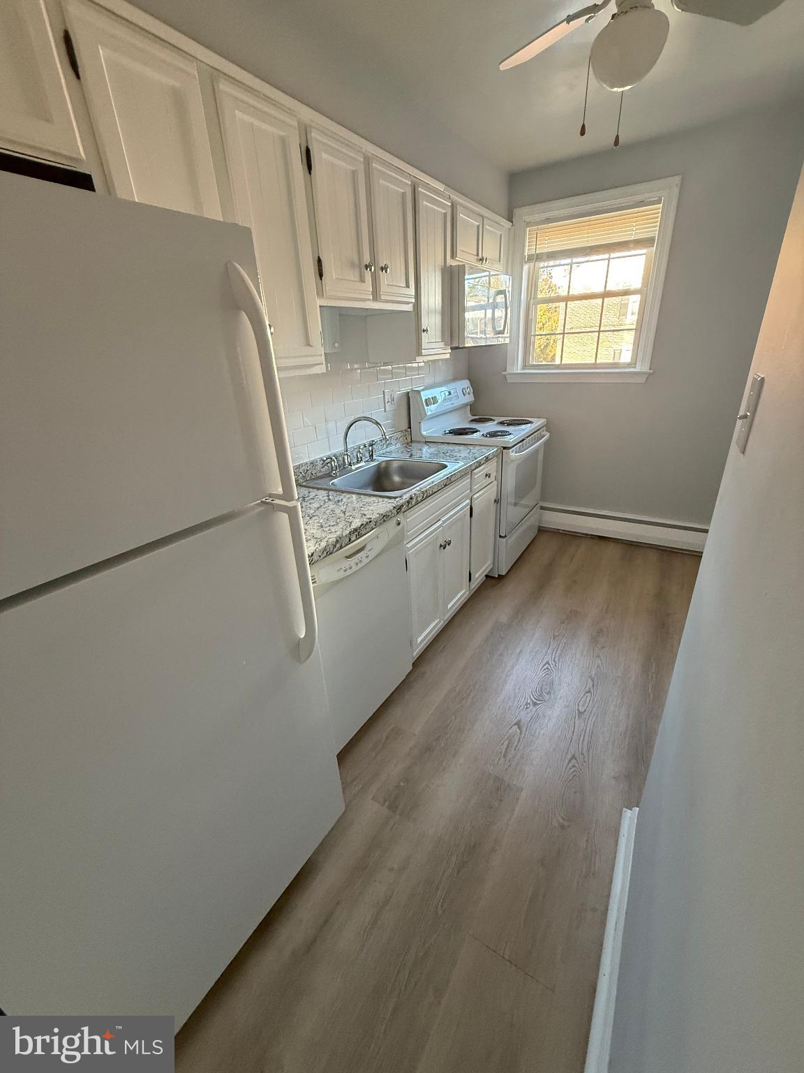 27 Wallingford Avenue Wallingford, PA 19086 - Photo 4 of 17 Bright and airy kitchen with modern finishes.