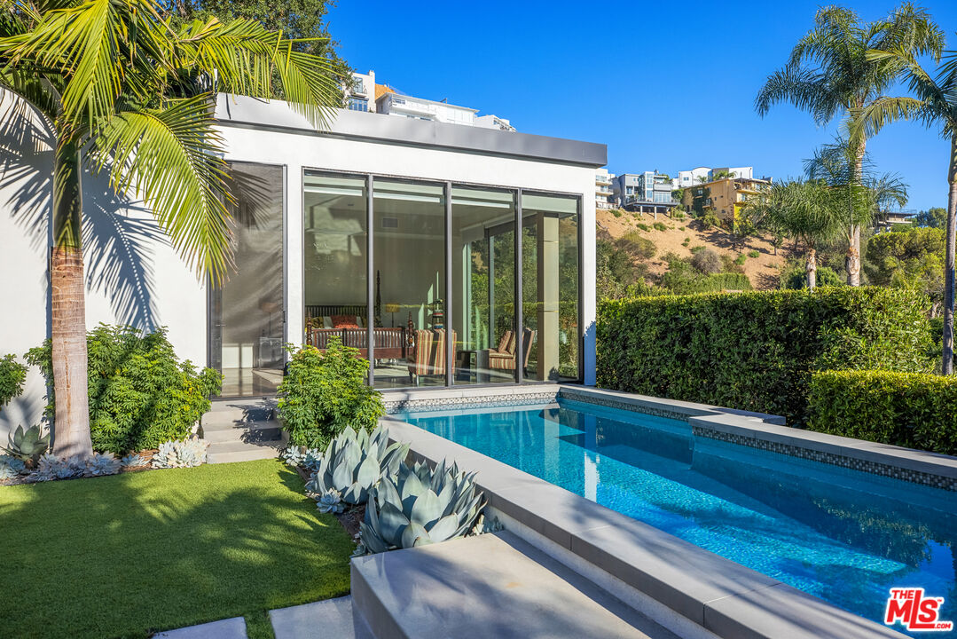 1717 Rising Glen Road Los Angeles, CA 90069 - Photo 11 of 30 a house view with a garden space