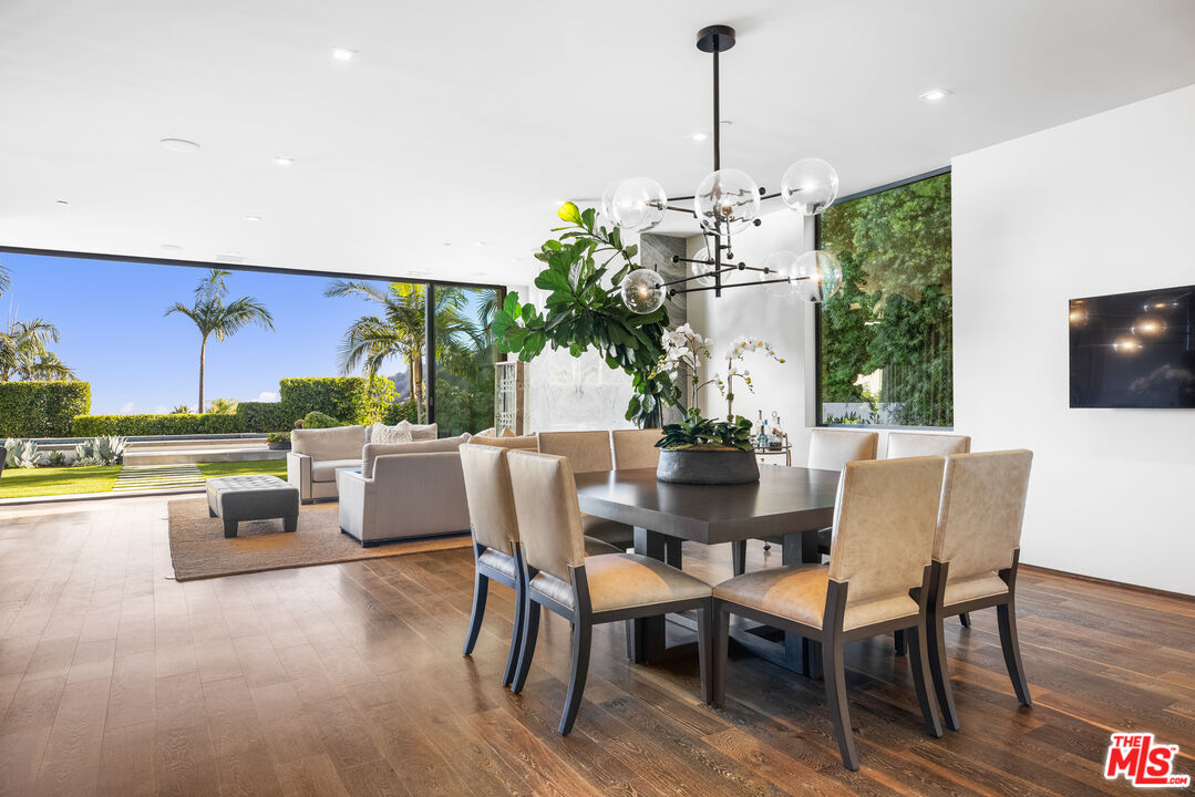 1717 Rising Glen Road Los Angeles, CA 90069 - Photo 16 of 30 a view of a dining room with furniture window and outside view