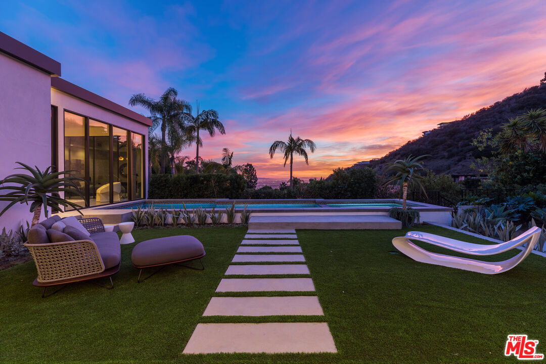 1717 Rising Glen Road Los Angeles, CA 90069 - Photo 30 of 30 a view of swimming pool with seating space