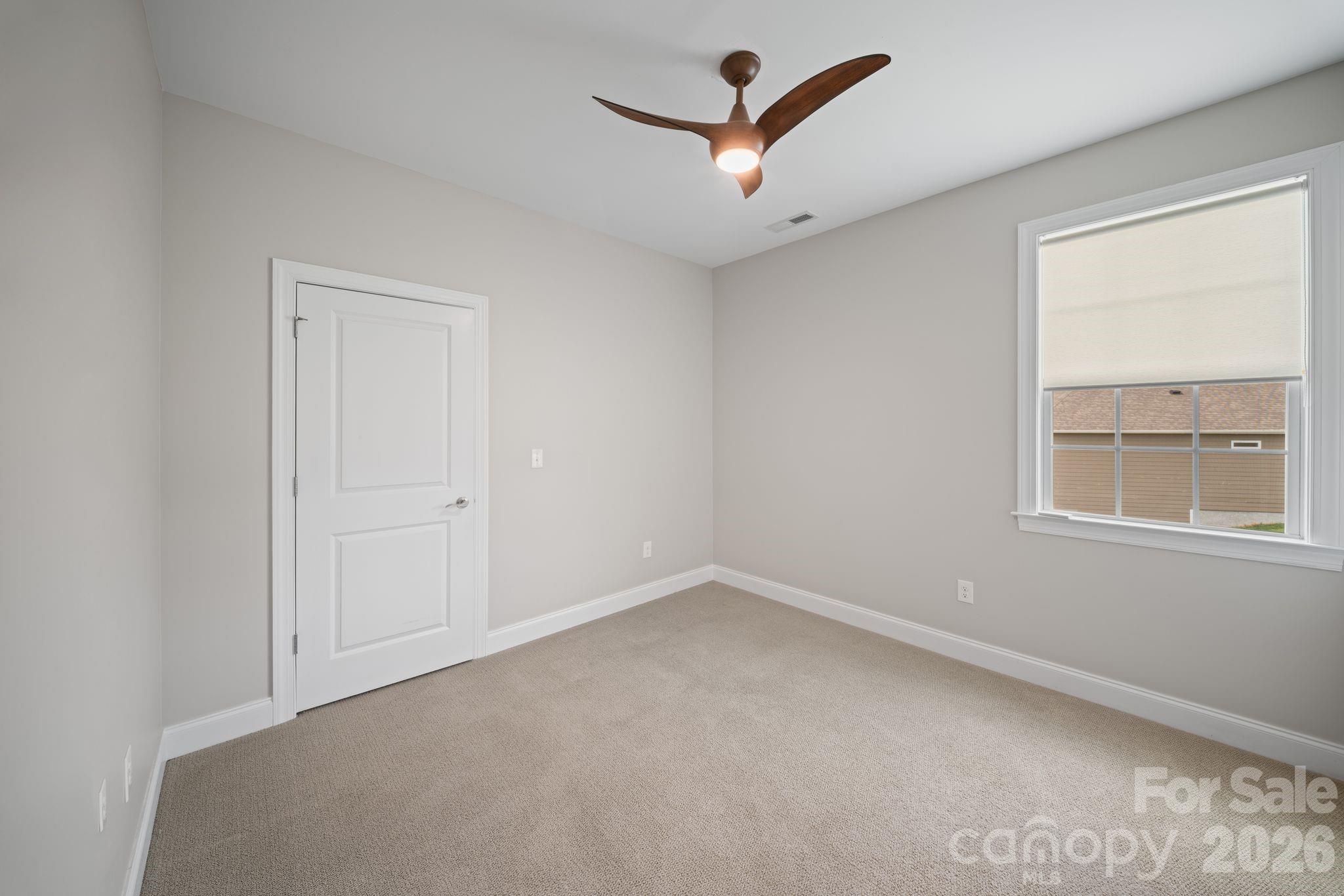 14 Rose Creek Road Leicester, NC 28748 - Photo 23 of 42 an empty room with a window