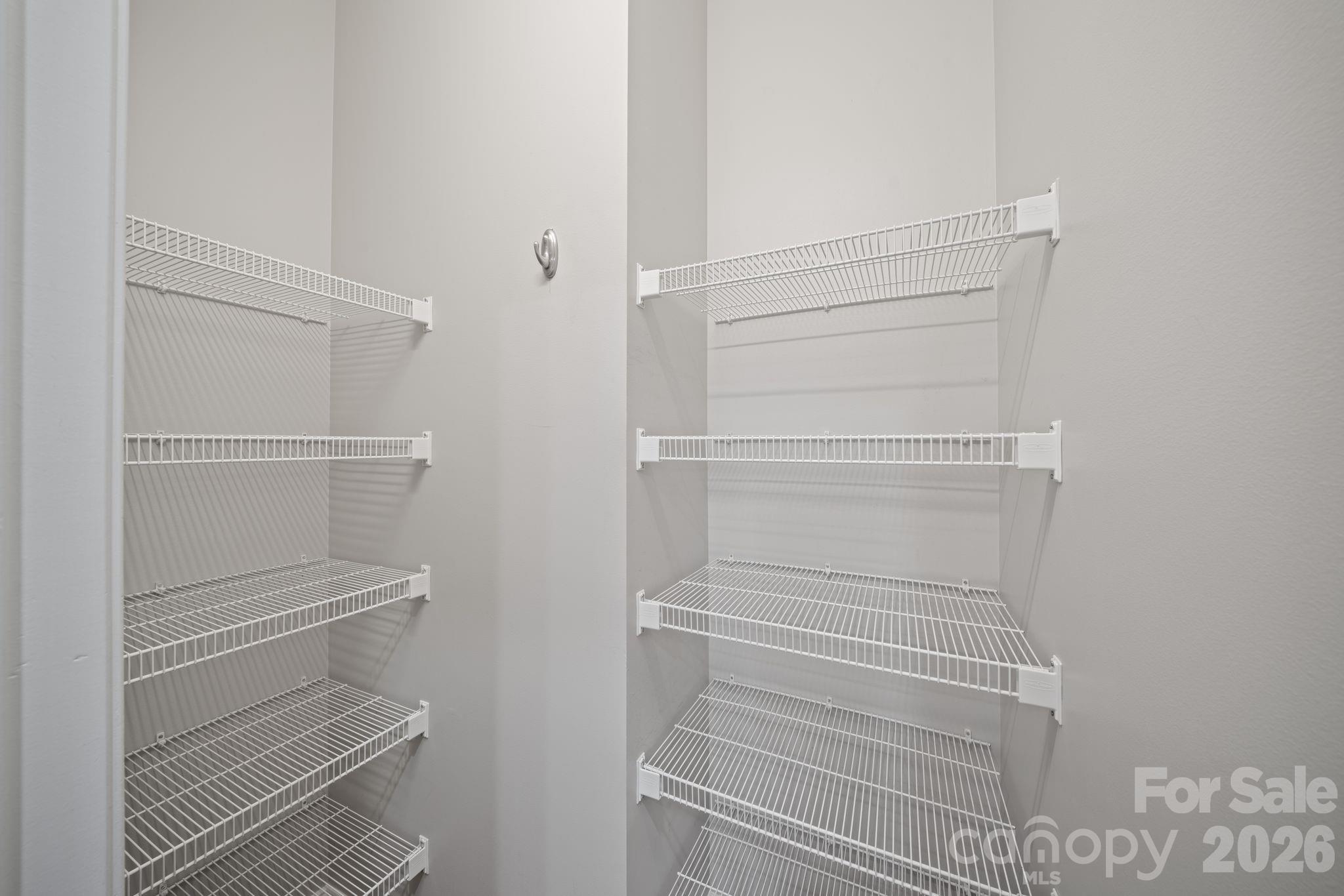 14 Rose Creek Road Leicester, NC 28748 - Photo 24 of 42 a walk in closet with white paint