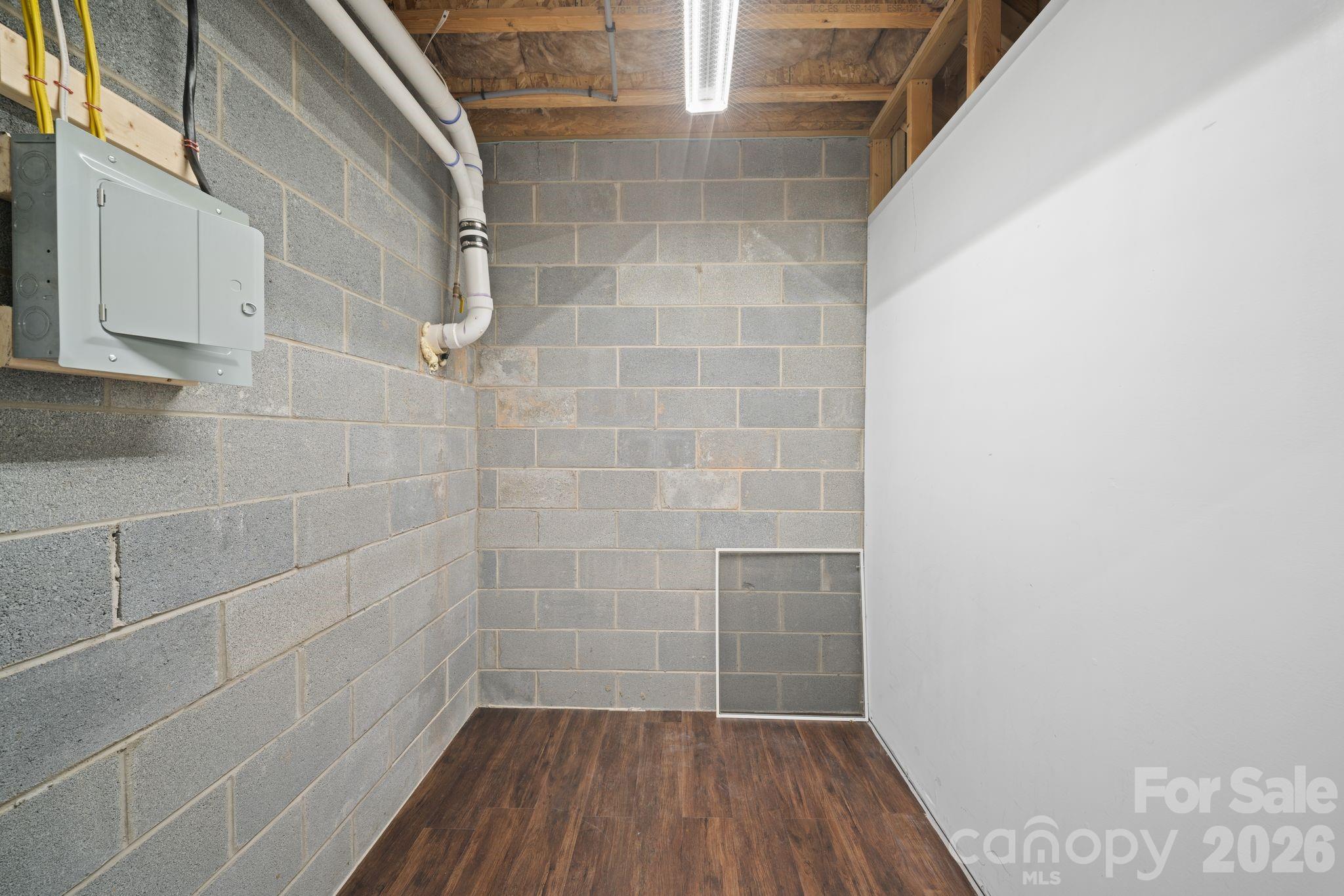 14 Rose Creek Road Leicester, NC 28748 - Photo 35 of 42 a bathroom with a wooden floor and a shower