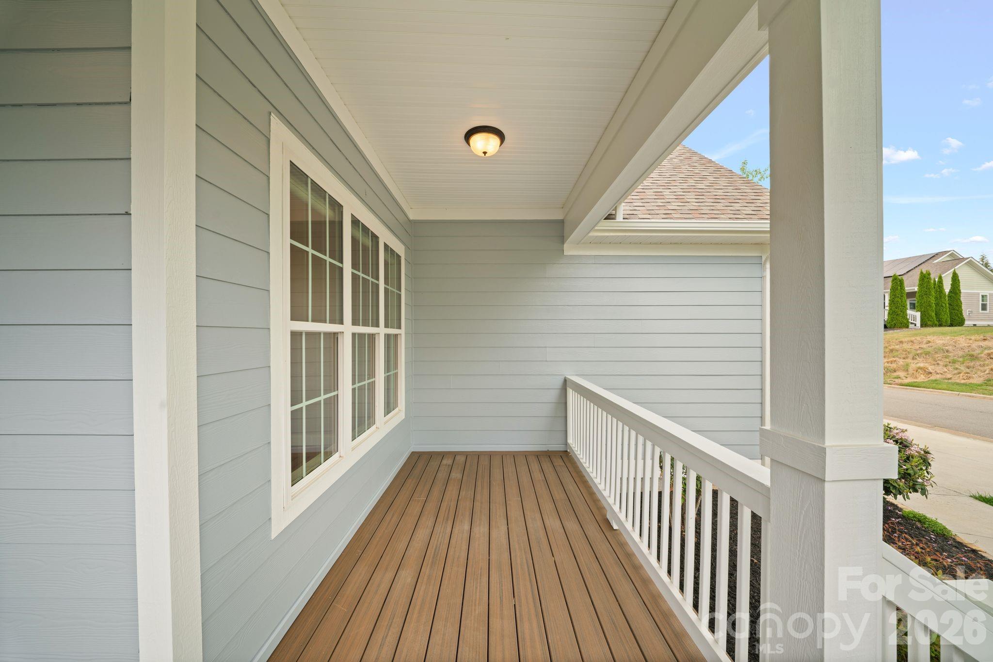 14 Rose Creek Road Leicester, NC 28748 - Photo 7 of 42 a view of balcony with wooden floor