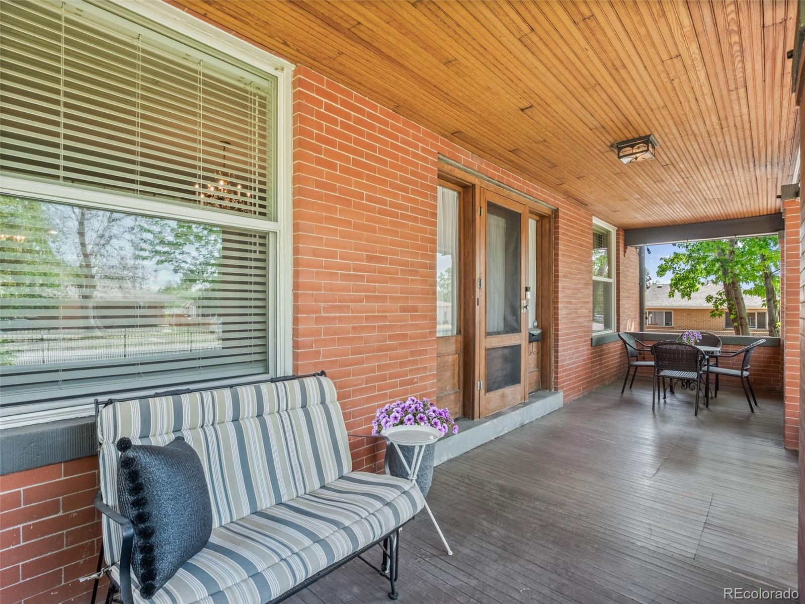 6595 West 46th Place Wheat Ridge, CO 80033 - Photo 5 of 48 a balcony with furniture and window