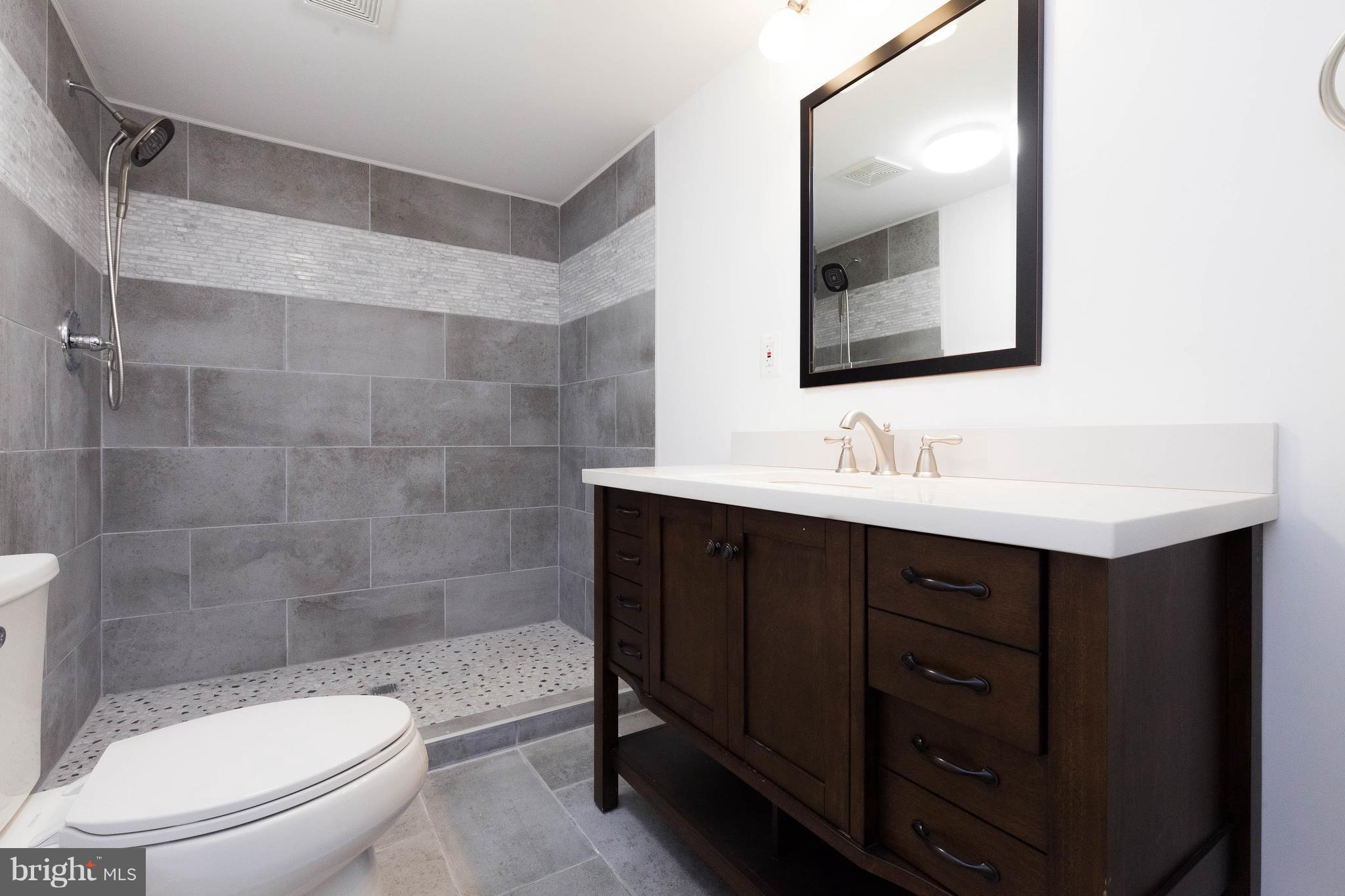 5317 Ridge Road Mount Airy, MD 21771 - Photo 22 of 30 Lower level Full Bath with custom tile work!