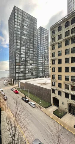 a view of roof deck with open kitchen