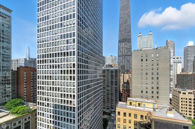 a view of a city with tall buildings