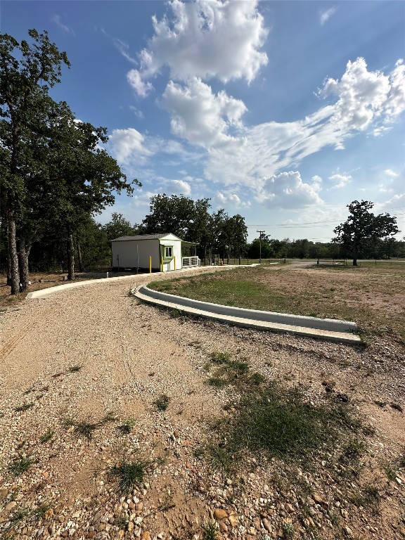 10096 Highway 183 Lockhart, TX 78644 - Photo 6 of 16 a view of tennis court