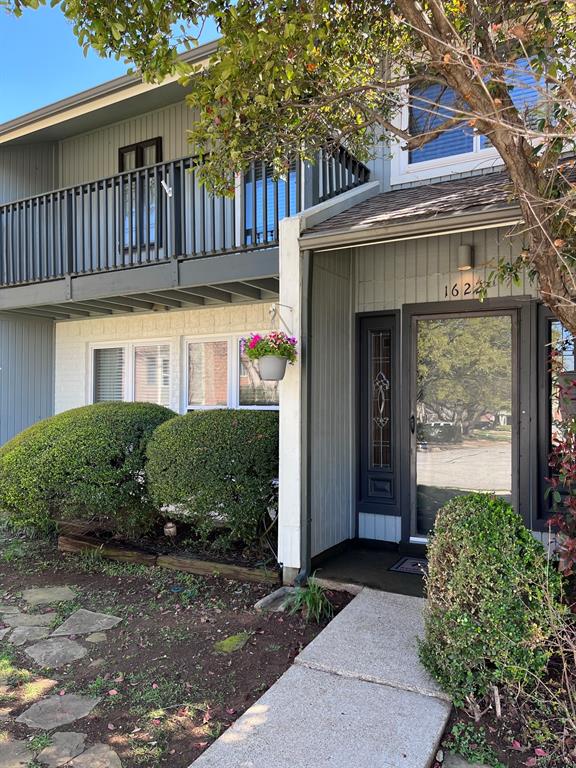 1622 Choteau Circle Grapevine, TX 76051 - Photo 1 of 1 a front view of a house with a yard