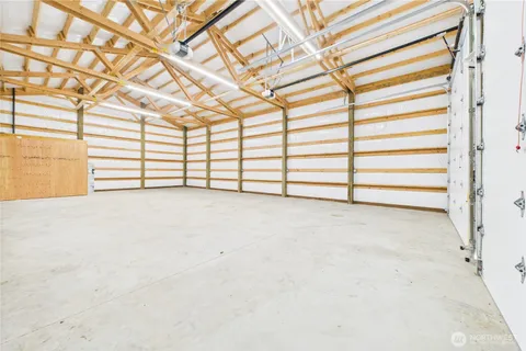 a view of a room with a white walls