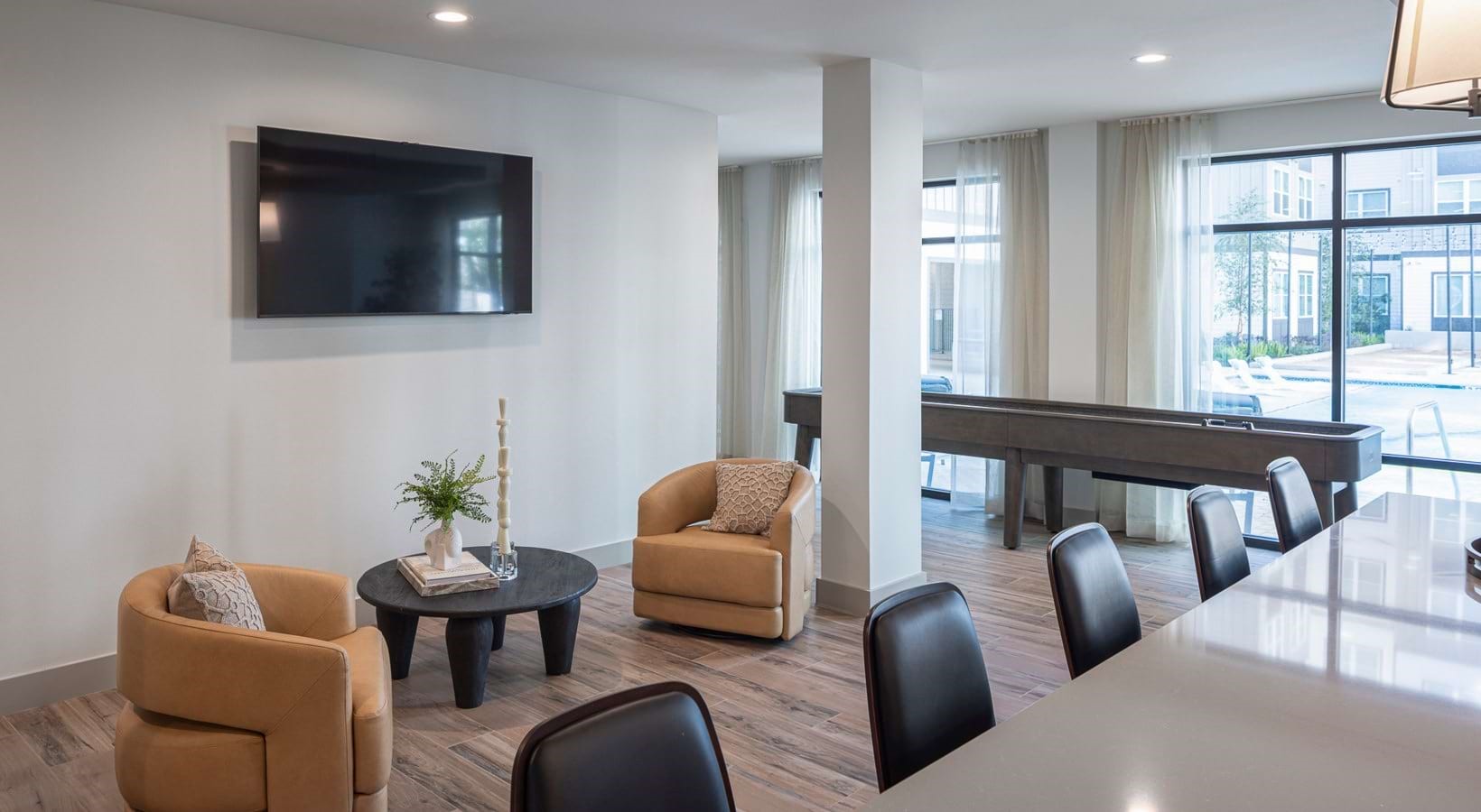 1505 Oliver Street, Unit 448 Houston, TX 77007 - Photo 33 of 48 a living room with furniture and a flat screen tv