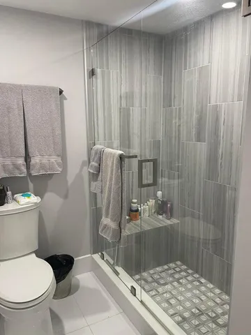 a bathroom with a sink and toilet