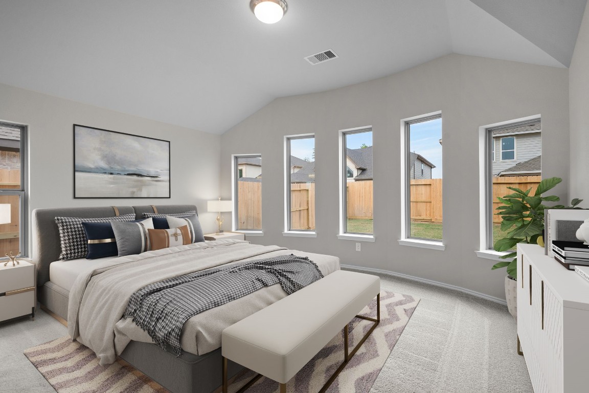 9515 Sierra Crest Lane Porter, TX 77365 - Photo 12 of 38 a bedroom with a large bed and a large window