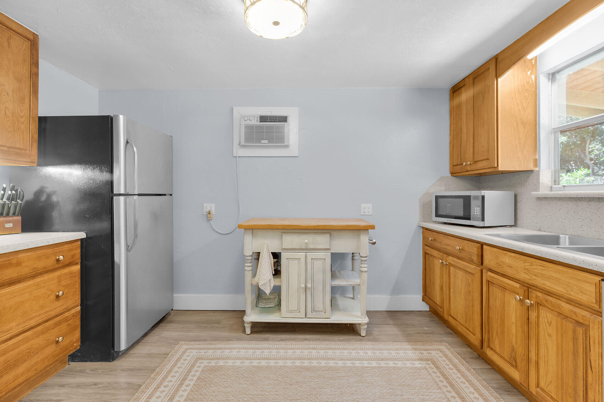 10 Dolphin Road Key Largo, FL 33037 - Photo 13 of 55 a kitchen with stainless steel appliances a refrigerator and a sink