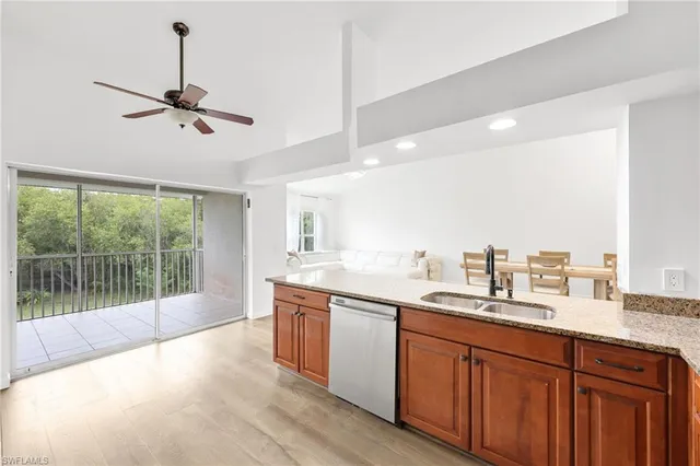 a spacious bathroom with a granite countertop sink mirror and double