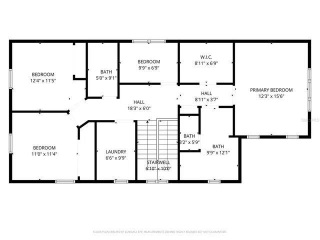 a view of a park with iron fence