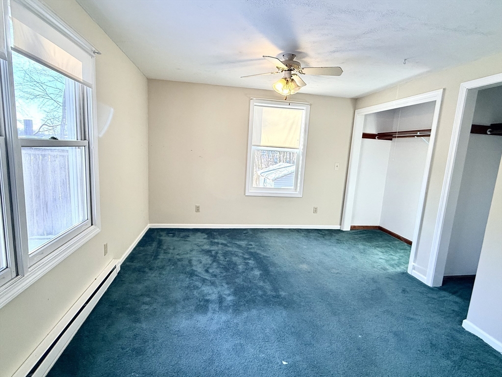 6 Roald Street Worcester, MA 01605 - Photo 5 of 11 an empty room with windows and closet