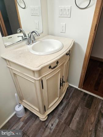 2110 Mays Landing Road, Unit WALL Millville, NJ 08332 - Photo 12 of 18 a bathroom with a sink and a mirror