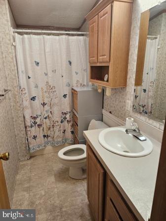 2110 Mays Landing Road, Unit WALL Millville, NJ 08332 - Photo 14 of 18 a bathroom with a sink toilet and shower