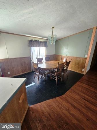 2110 Mays Landing Road, Unit WALL Millville, NJ 08332 - Photo 9 of 18 a view of a dining room with furniture and wooden floor