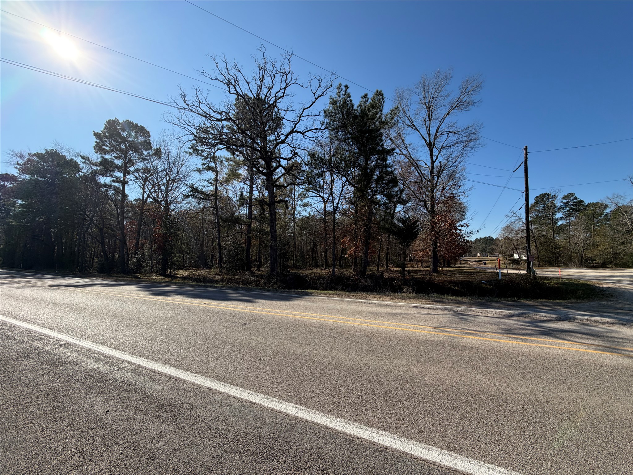 Tbd Overland Trail Trinity, TX 75862 - Photo 2 of 6 a street view of a house with a yard