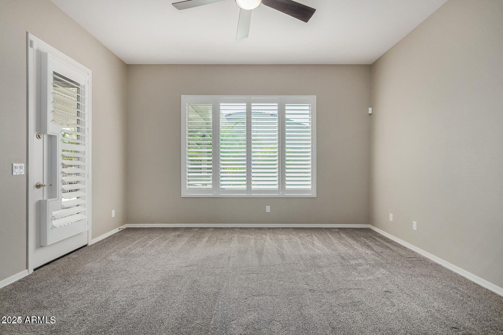 15430 South 183rd Lane Goodyear, AZ 85338 - Photo 20 of 66 a view of an empty room with a window