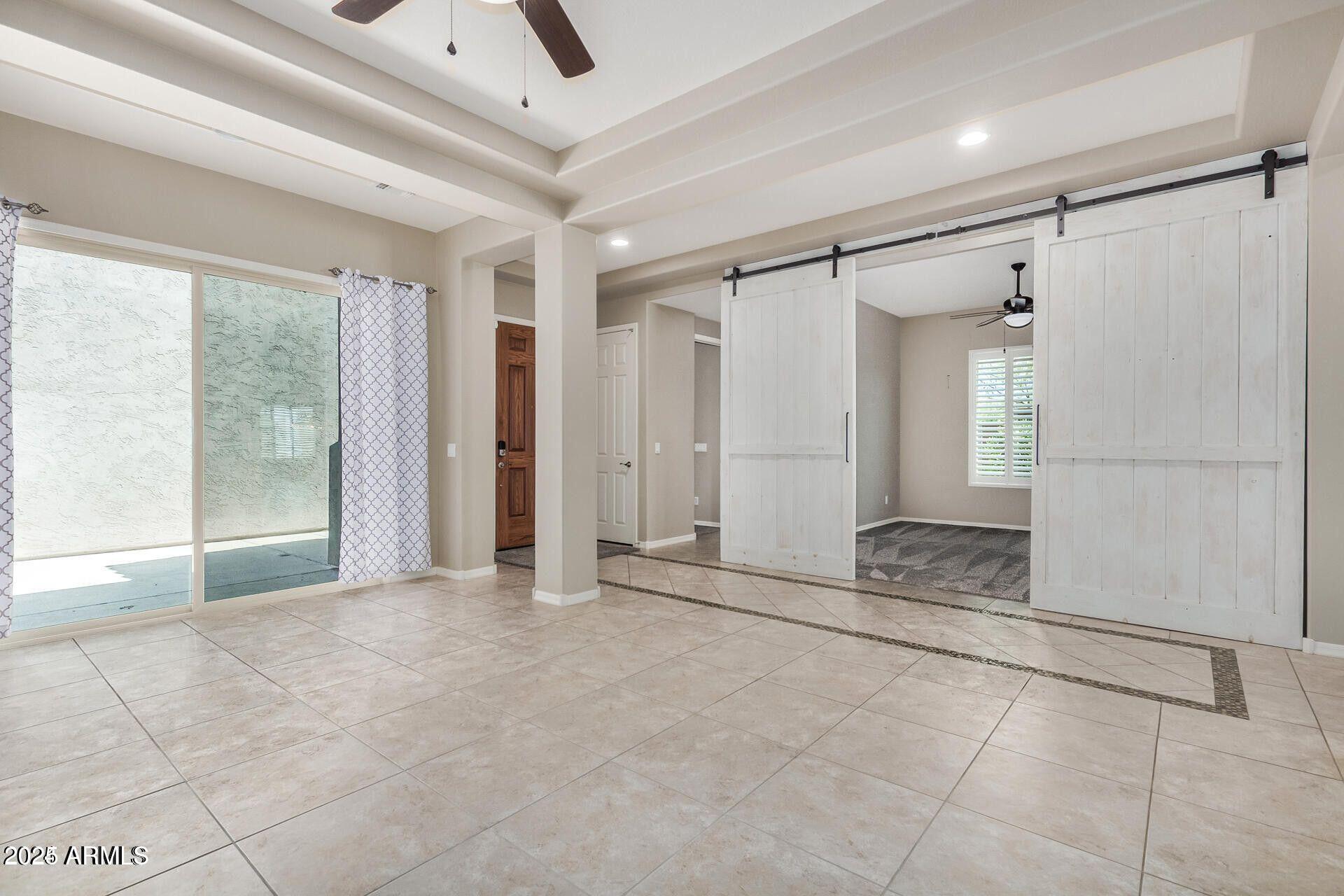 15430 South 183rd Lane Goodyear, AZ 85338 - Photo 6 of 66 a view of an empty room