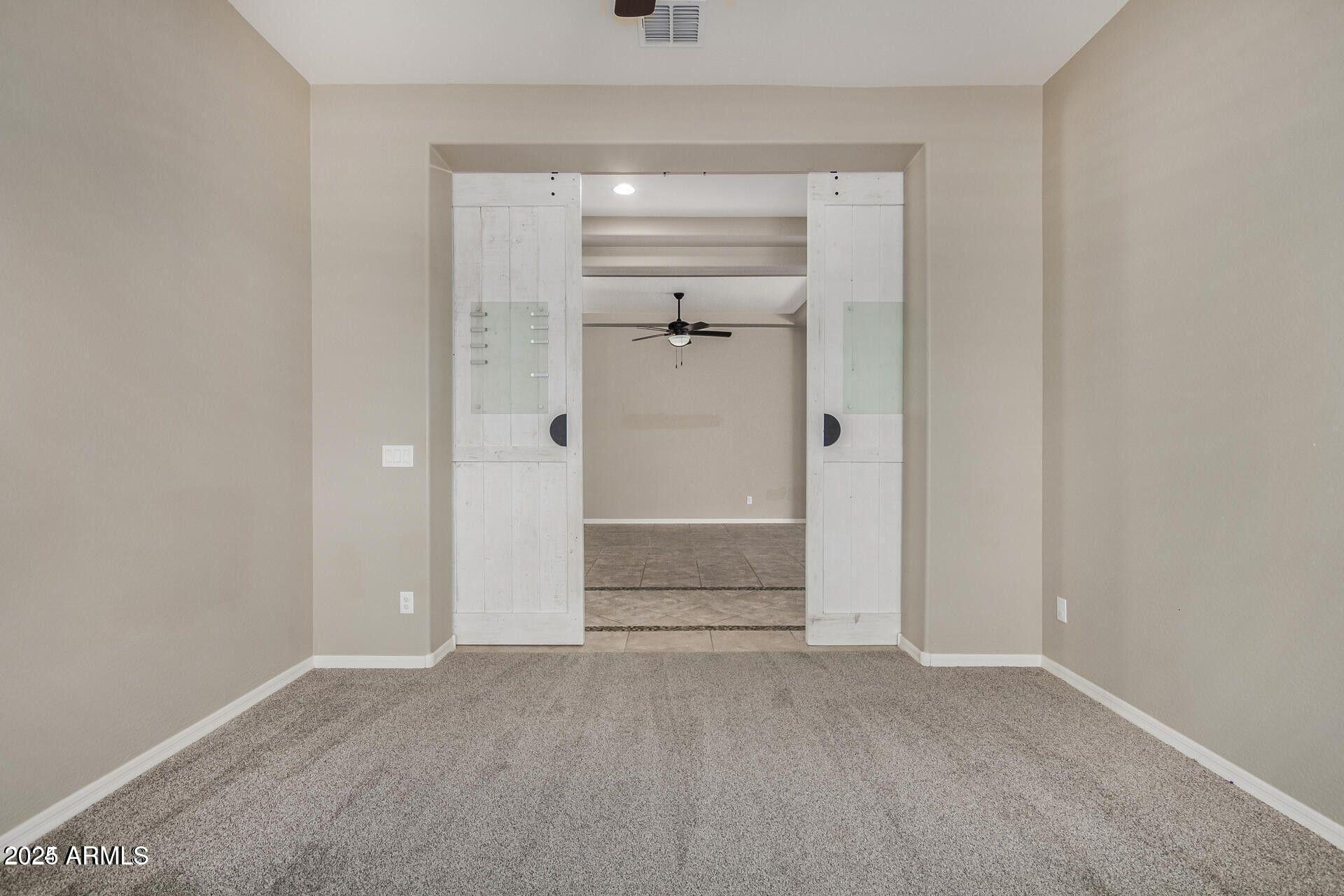 15430 South 183rd Lane Goodyear, AZ 85338 - Photo 8 of 66 a view of an empty room