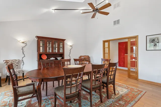 a spacious bedroom with a large bed and a window